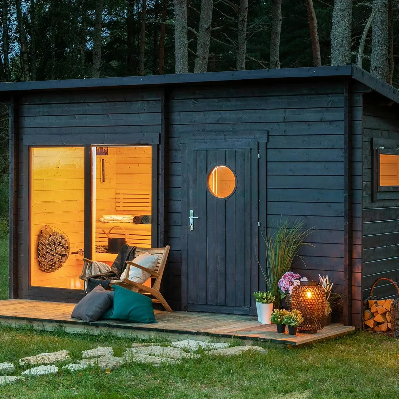 Supplier catalog outdoor sauna room with dark exterior, glass facade and warm timber interior