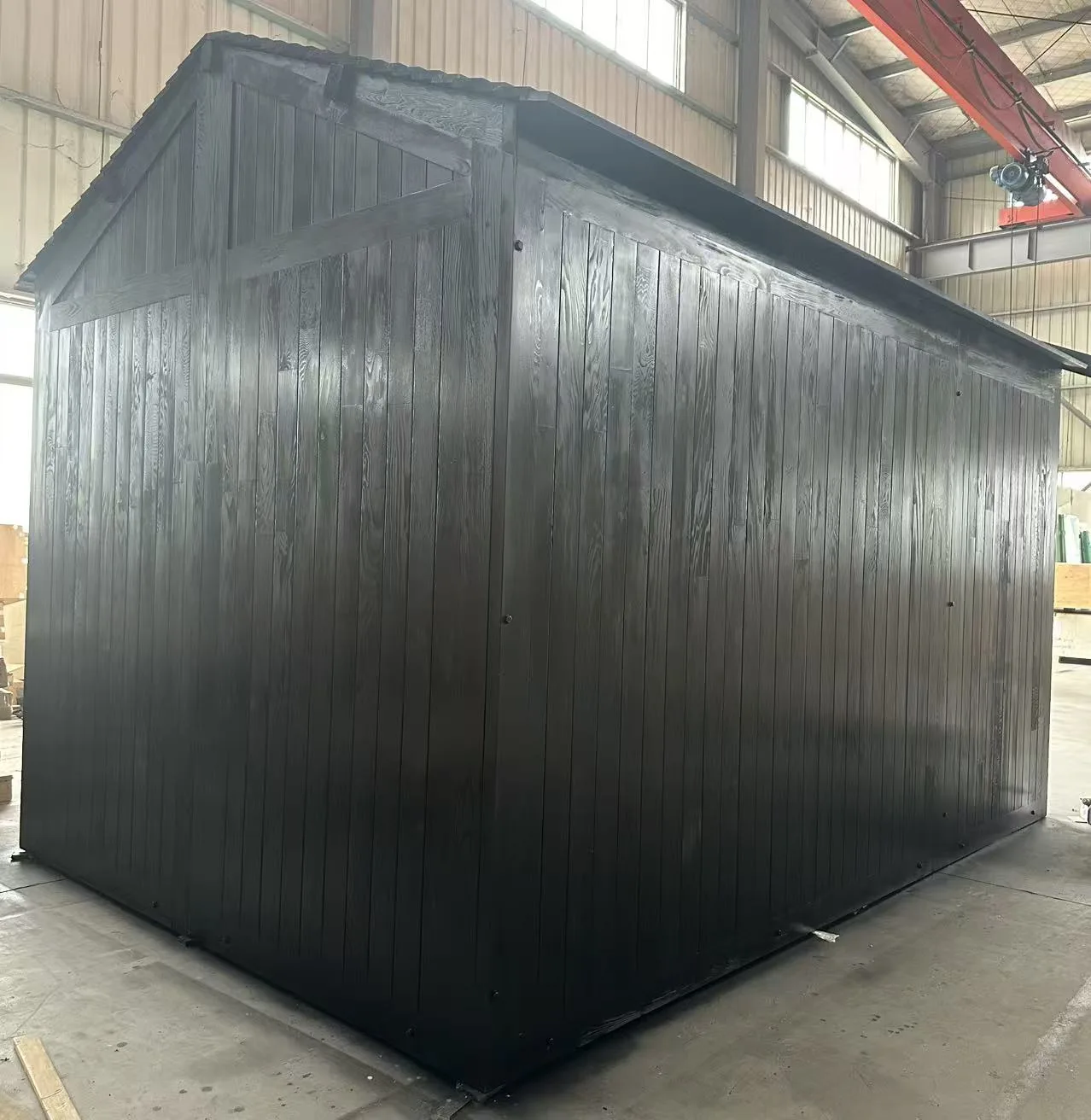 Outdoor sauna cabin photographed during production